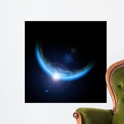 Earth with Rising Sun Wall Mural shown on a wall