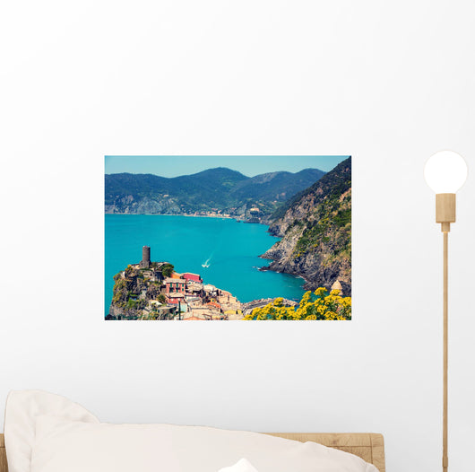 Rocky sea coast. Ligurian sea, view at Vernazza Village, Cinqe Terre, Italy Wall Mural