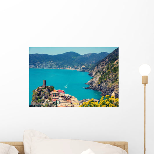 Rocky sea coast. Ligurian sea, view at Vernazza Village, Cinqe Terre, Italy Wall Mural