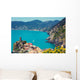 Rocky sea coast. Ligurian sea, view at Vernazza Village, Cinqe Terre, Italy Wall Mural