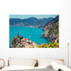 Rocky sea coast. Ligurian sea, view at Vernazza Village, Cinqe Terre, Italy Wall Mural