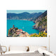 Rocky sea coast. Ligurian sea, view at Vernazza Village, Cinqe Terre, Italy Wall Mural
