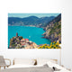 Rocky sea coast. Ligurian sea, view at Vernazza Village, Cinqe Terre, Italy Wall Mural