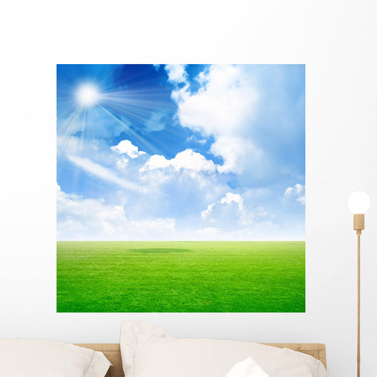 abstract scene green meadow under light sky Wall Mural