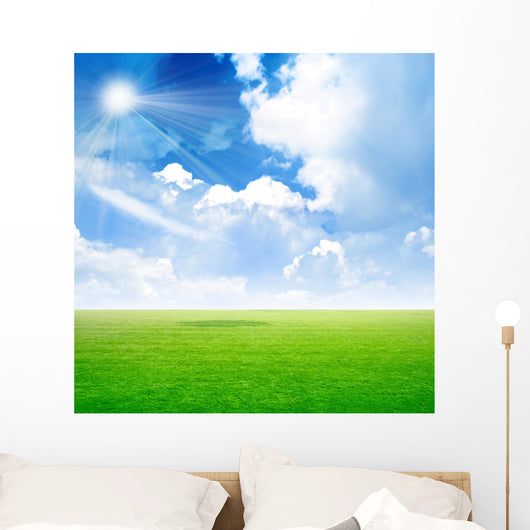 abstract scene green meadow under light sky Wall Mural