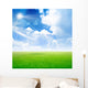 abstract scene green meadow under light sky Wall Mural