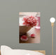 flower in white bowl and bottle of oil. spa and body care backgr Wall Mural