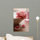 flower in white bowl and bottle of oil. spa and body care backgr Wall Mural