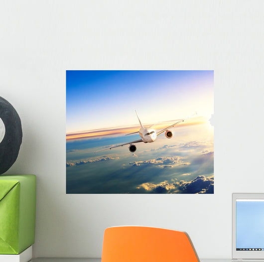 Airplane Flying Closer above Clouds Wall Decal