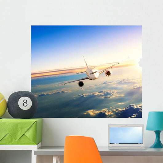 Airplane Flying Closer above Clouds Wall Decal