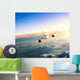 Airplane Flying Closer above Clouds Wall Decal