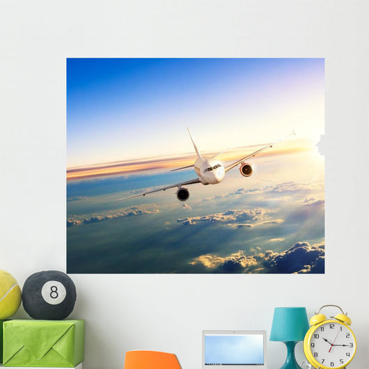 Airplane Flying Closer above Clouds Wall Decal