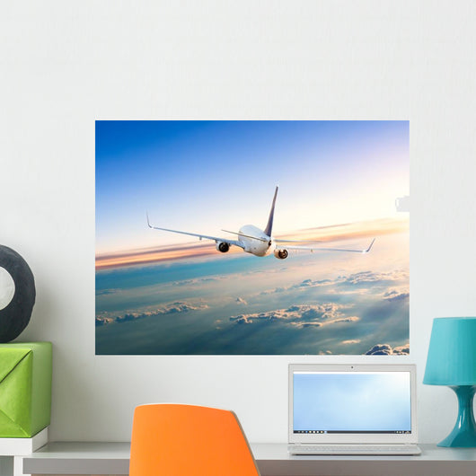 Airplane Flying Away above Clouds Wall Decal