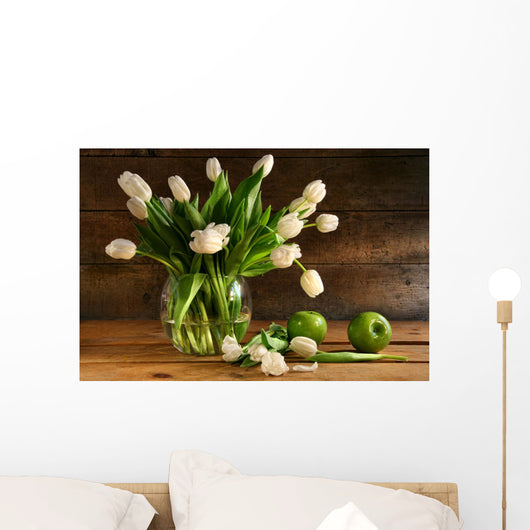White tulips in glass vase on rustic wood Wall Mural