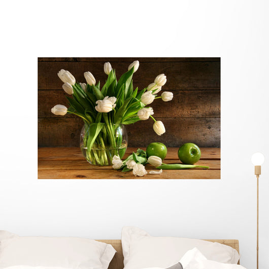 White tulips in glass vase on rustic wood Wall Mural