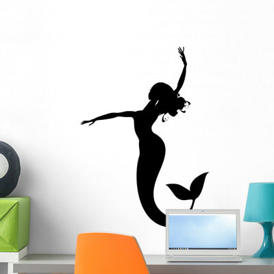 Mermaid Silhouette Wall Decal shown on a wall