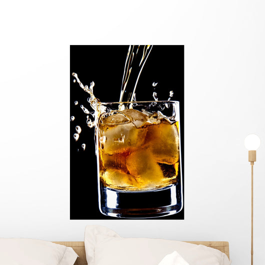 glass of whiskey and ice isolated over black background Wall Mural