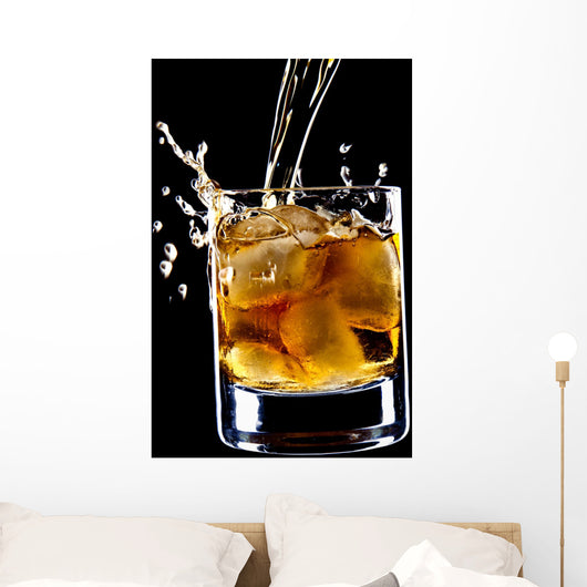 glass of whiskey and ice isolated over black background Wall Mural