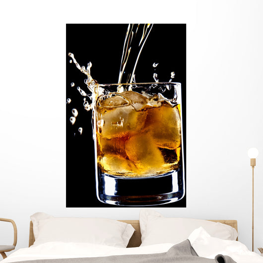 glass of whiskey and ice isolated over black background Wall Mural