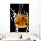 glass of whiskey and ice isolated over black background Wall Mural