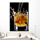 glass of whiskey and ice isolated over black background Wall Mural