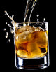 glass of whiskey and ice isolated over black background Wall Mural