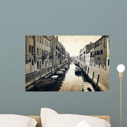 Narrow canal and embankment in Venice, Italy Wall Mural