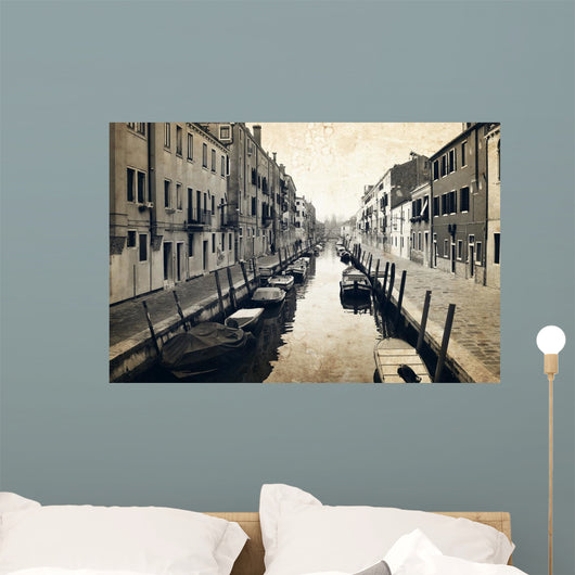 Narrow canal and embankment in Venice, Italy Wall Mural