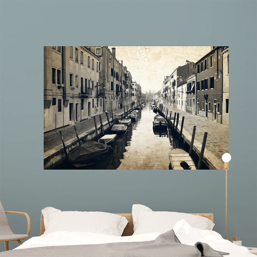 Narrow canal and embankment in Venice, Italy Wall Mural