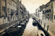 Narrow canal and embankment in Venice, Italy Wall Mural