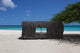 Beach hut on caribbean coast in Aruba Wall Mural
