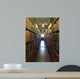 A man studying inside a library in England Wall Mural