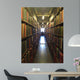 A man studying inside a library in England Wall Mural