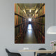A man studying inside a library in England Wall Mural
