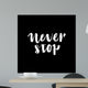Handdrawn lettering of a phrase Never Stop. Wall Mural