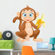 Cartoon monkey holding banana Wall Decal