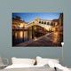 Famous Rialto Bridge during sunrise in Venice. Wall Mural