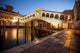 Famous Rialto Bridge during sunrise in Venice. Wall Mural