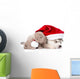 scottish kitten and sleeping Siberian Husky puppy with red santa hat. isolated on white Wall Decal