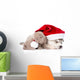 scottish kitten and sleeping Siberian Husky puppy with red santa hat. isolated on white Wall Decal