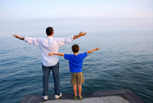 father son ocean Wall Mural