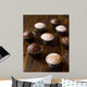 Homemade vanilla and chocolate muffins on a dark wooden table. Wall Mural