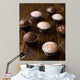 Homemade vanilla and chocolate muffins on a dark wooden table. Wall Mural