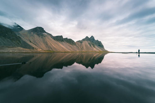 Landscape with mountains reflected in water, Iceland Wall Mural