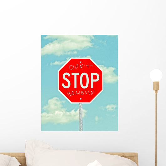 stop sign with graffiti Wall Mural