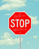 stop sign with graffiti Wall Mural