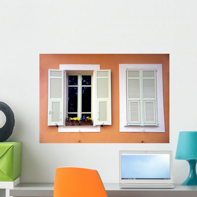 White Shutters Wall Mural shown on a wall