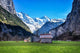 House in valley, Lauterbrunnen, Switzerland Wall Mural