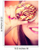 Funny woman holds cake in hand covering her eye Wall Mural