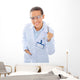 A young dentist with a tool on a white background Wall Decal